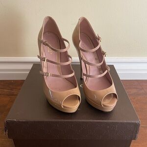 Authentic Gucci leather peep toe heels with 3 buckle detail in cream color